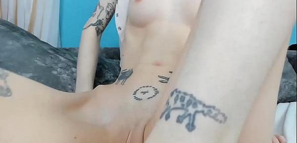  Petite babe with tattoos sucks dildo and teases pussy